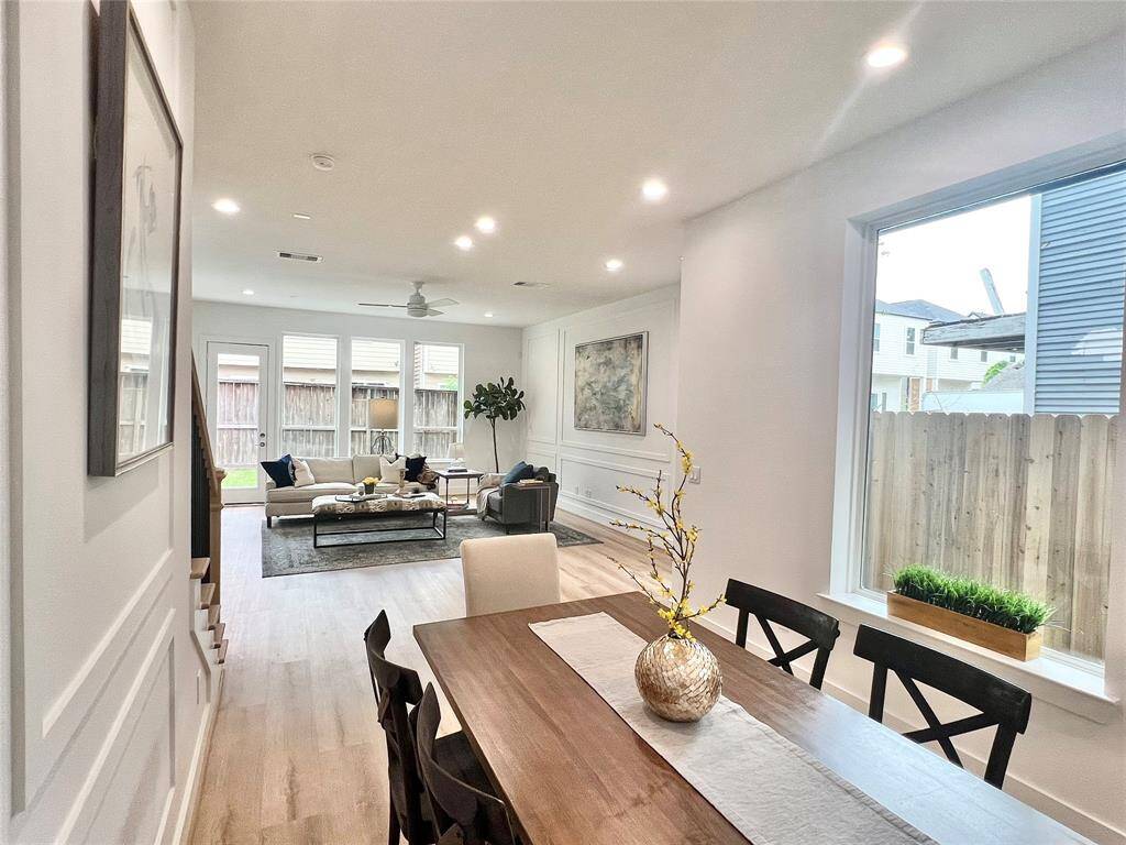 A light-filled dining area that seamlessly connects to the rest of the open floor plan.