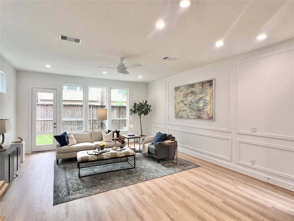 Classic meets contemporary with detailed wood paneling that enhances visual depth.