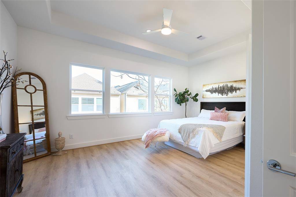 A spacious, airy room with clean lines and luxurious touches to create the ultimate restful space.