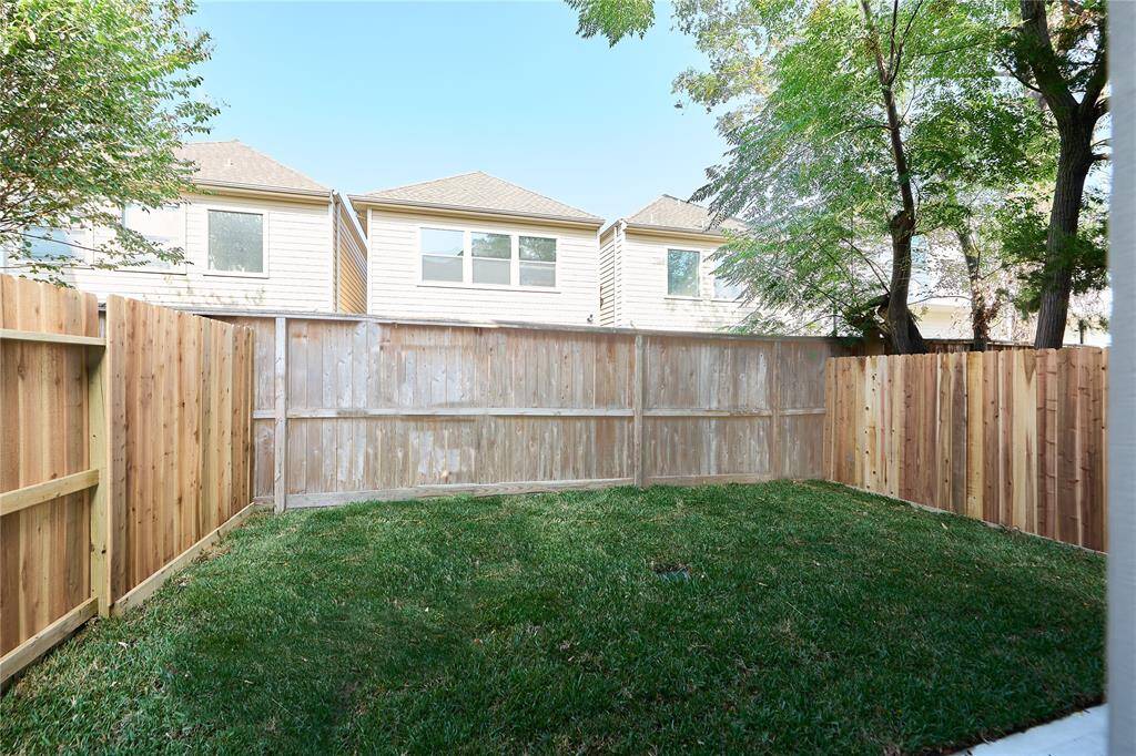Private backyard oasis with lush landscaping.?