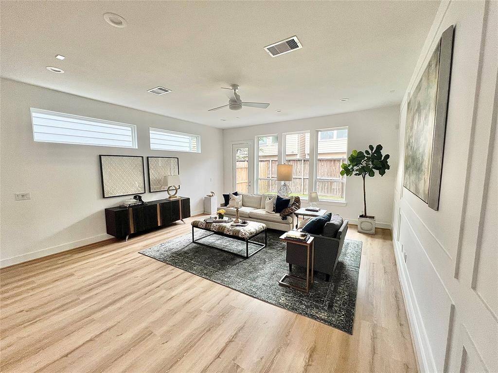 An inviting entryway featuring high ceilings and abundant natural light.?