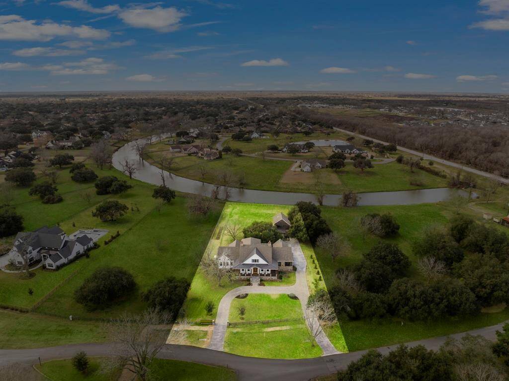 This property features a spacious home set on a large, lush lot with a circle driveway. Fulbrook's acreage lots combine the best of country living with an upscale atmosphere. You can build your own private dock to keep your canoe or just have a closer setting to your lake.