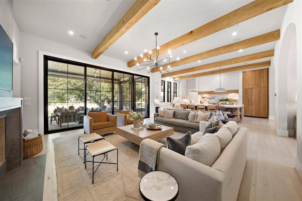 Living Room ties in perfectly to the kitchen and outdoor patio.