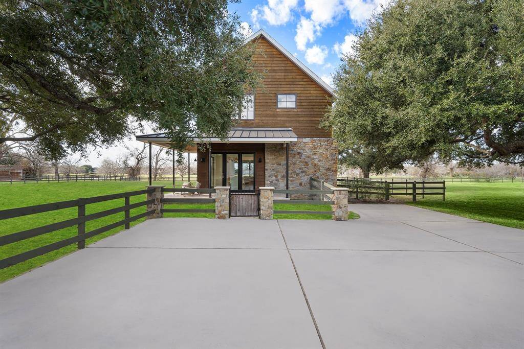 Property includes a gorgeous 2 story Casita with 1,565 sq ft of space separated into an entertaining bar, dining room, living room, dedicated kitchen, downstairs bathroom, upstairs bedroom, and upstairs bathroom.