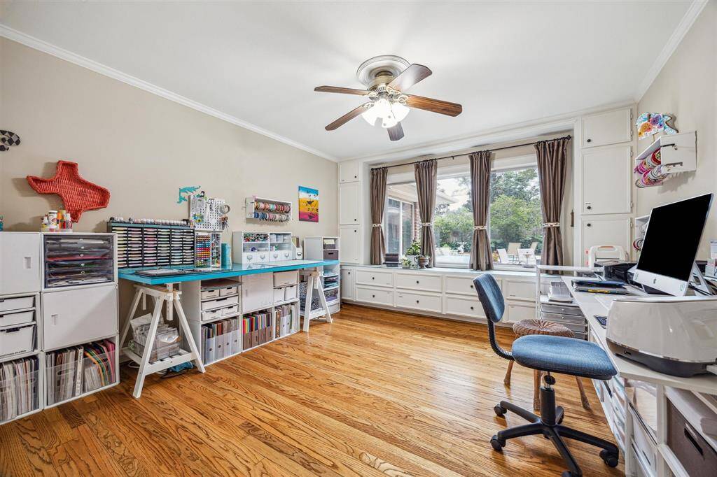 Natural light filters through the large windows making the room warm and welcoming.