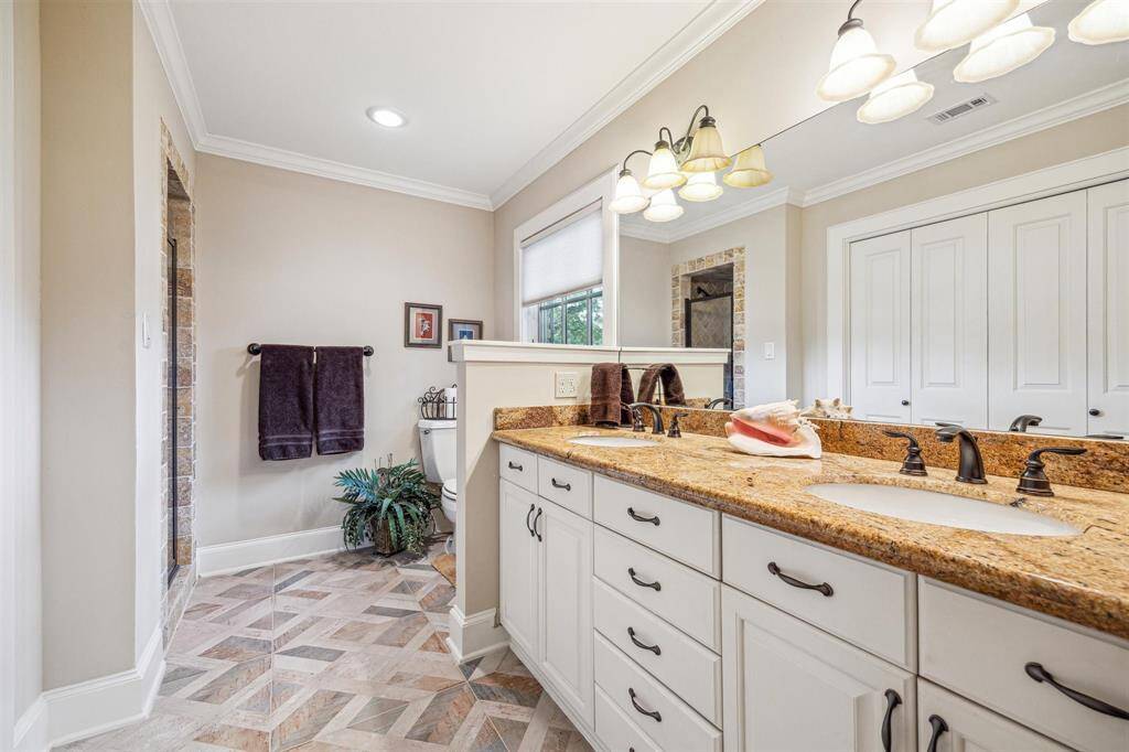 Fully renovated half bath is just off the main hallway