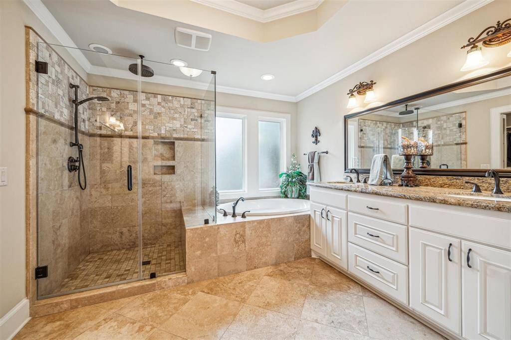 Bedroom #2 with it's own private bathroom complete with glass enclosure shower.