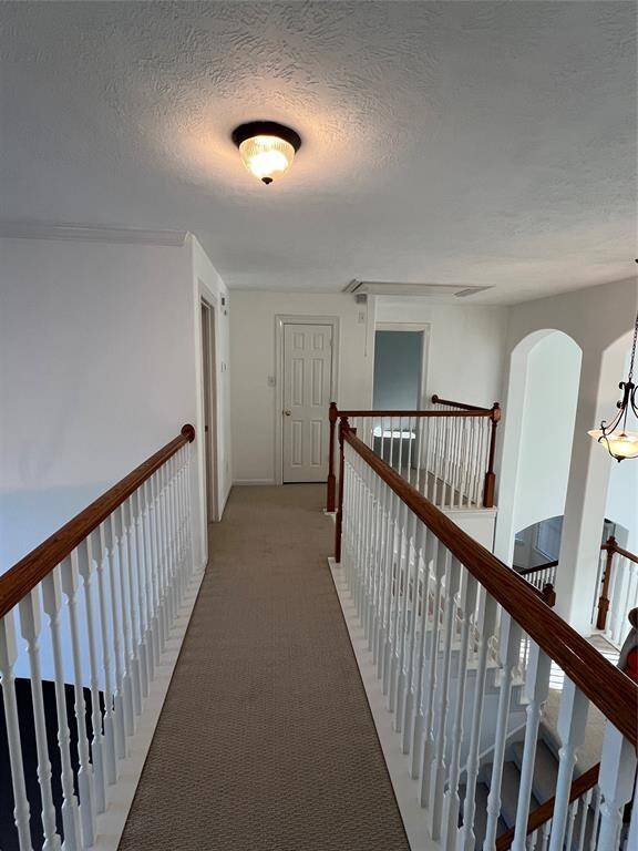 Balcony views 2-Story Reception Foyer and 2-Story FamilyRm