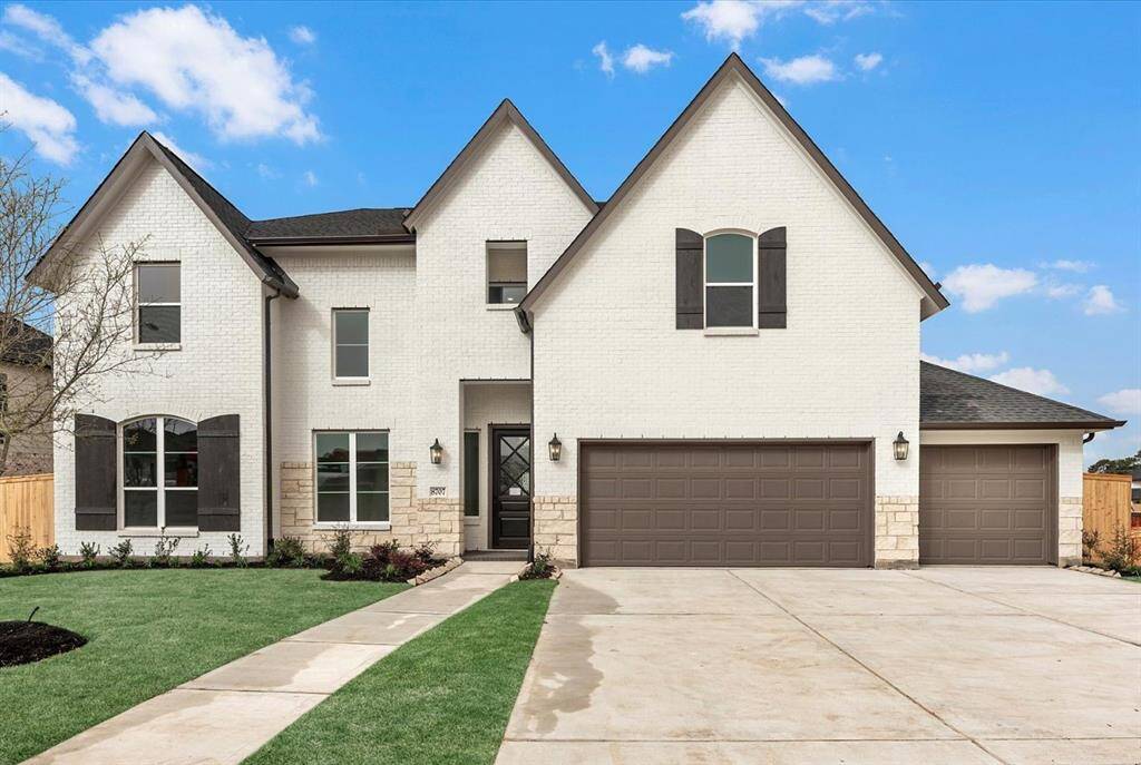 MOVE IN READY!! Westin Homes NEW Construction (Carter IX, Elevation K) Two story. 5 bedrooms, 4.5 baths. Green grass added to enhance photo.