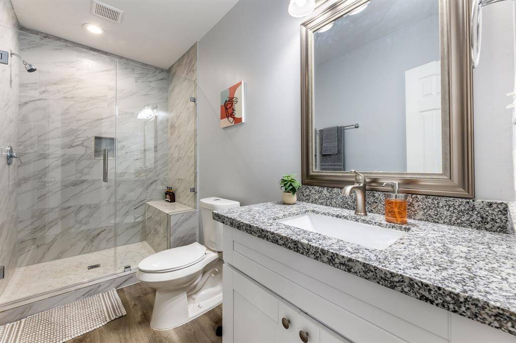 Frame-less walk in shower