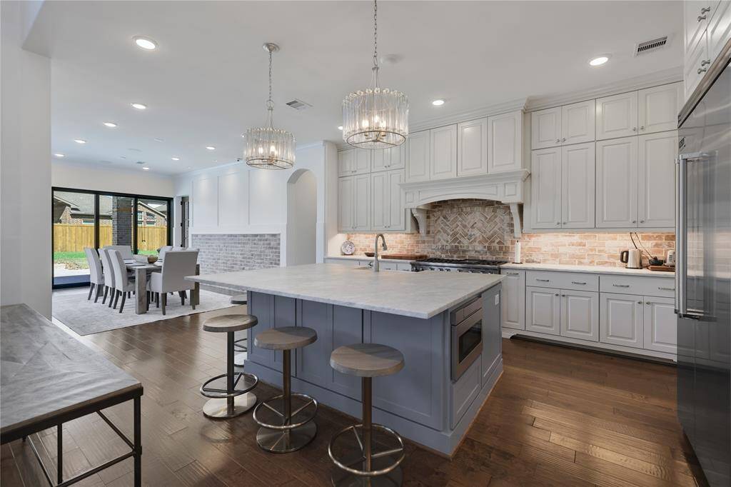 View of kitchen - Island with slate blue paint - onyx countertops