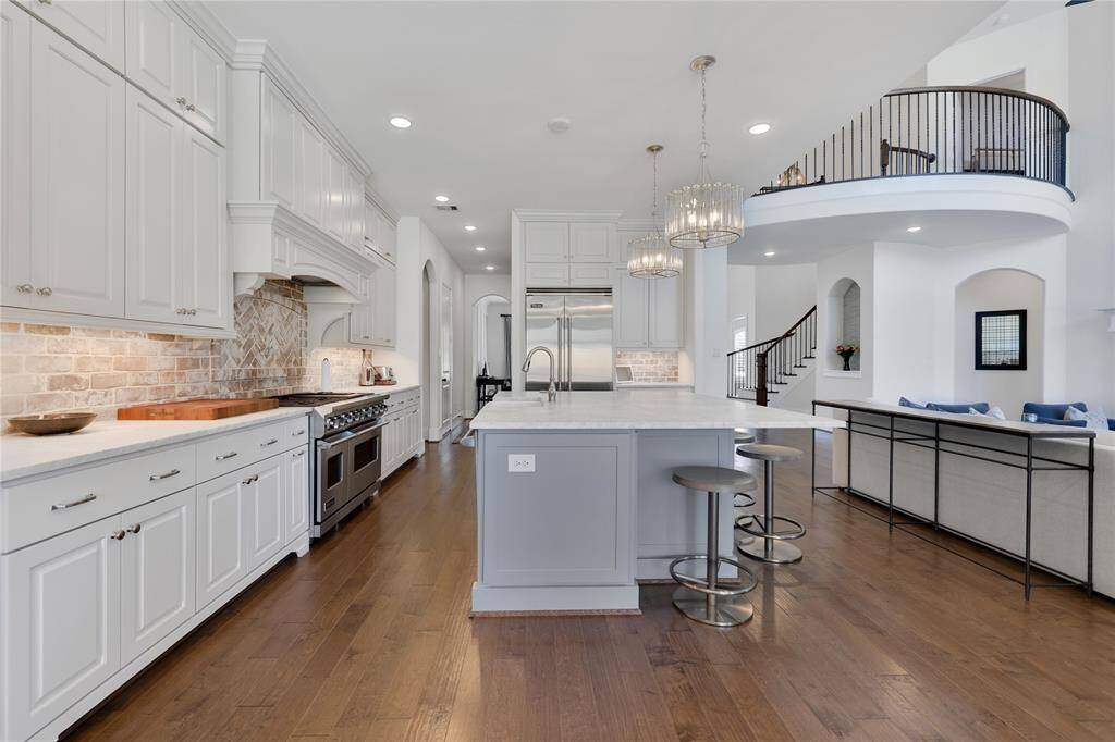 Another view of kitchen - abundant cabinetry and counter top space