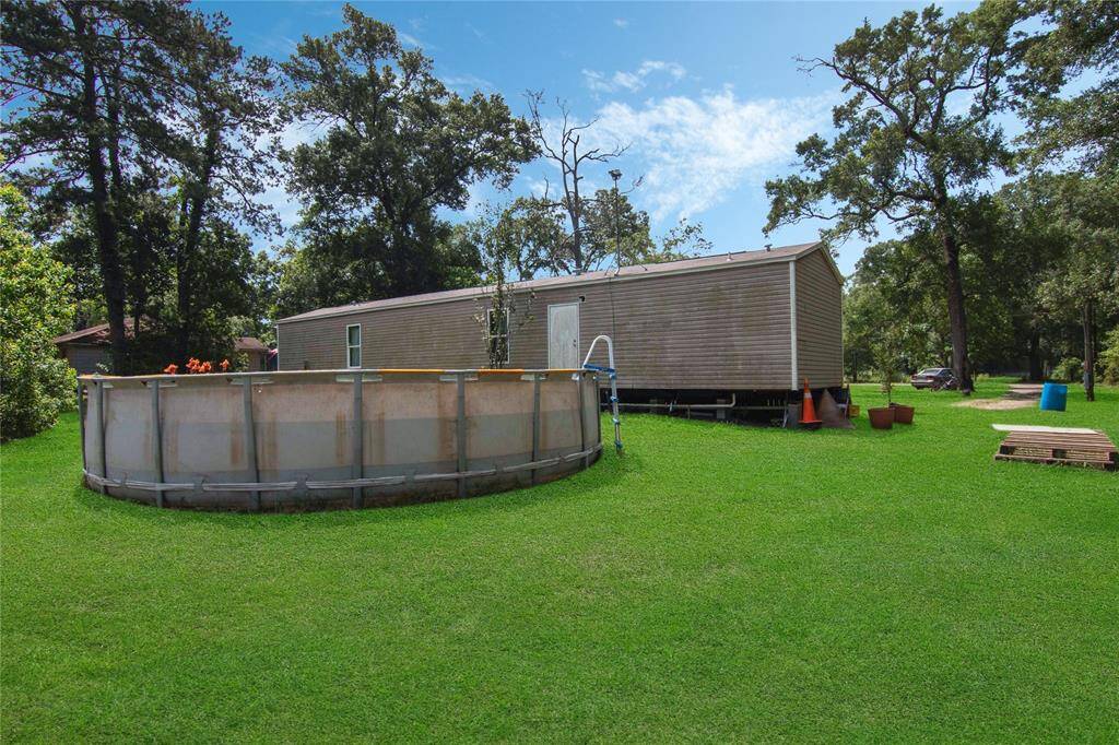 Huge backyard with above ground pool for the hot summer days!