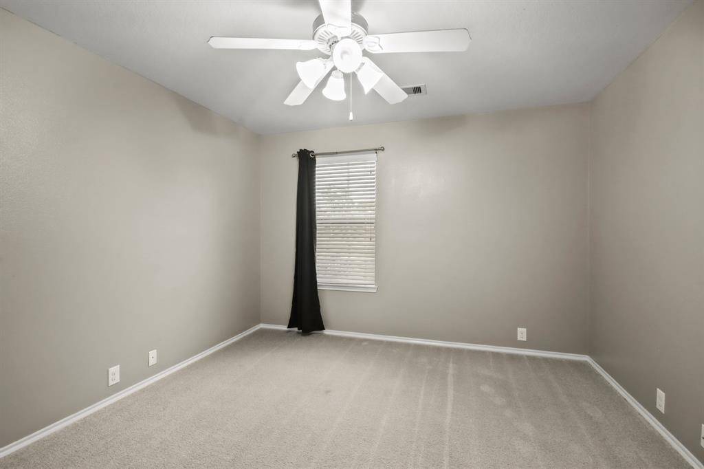 Upstairs secondary bedroom.