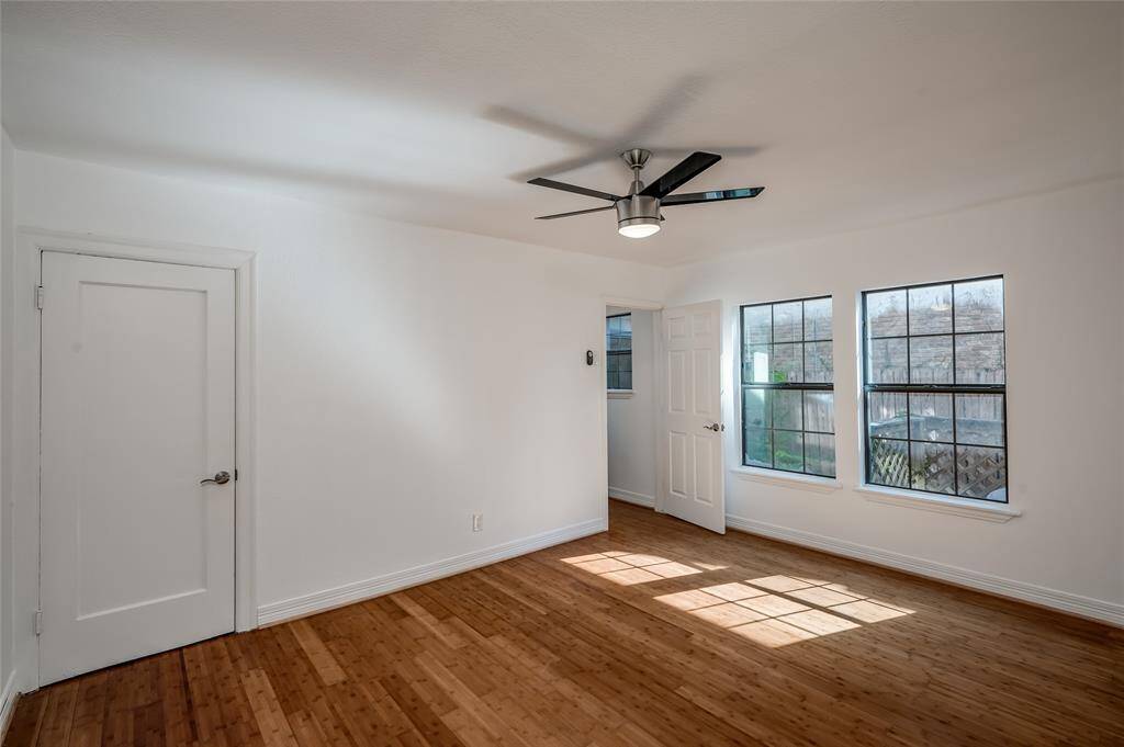 Roomy bedrooms with wood floors, and windows that keep things light and bright.