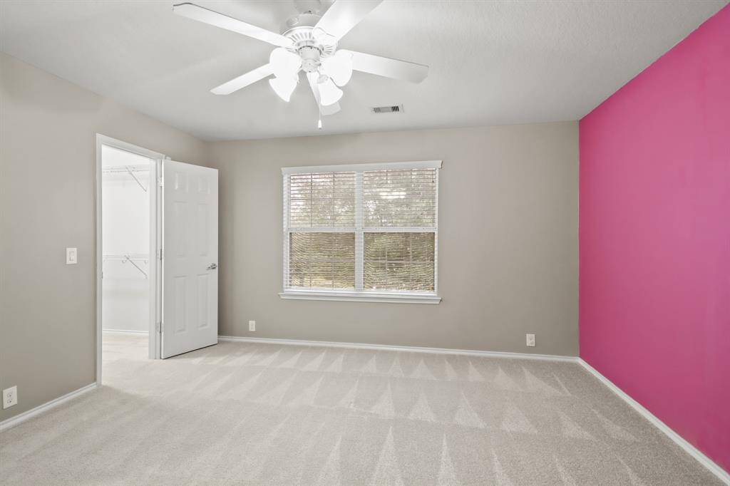 Upstairs secondary bedroom.