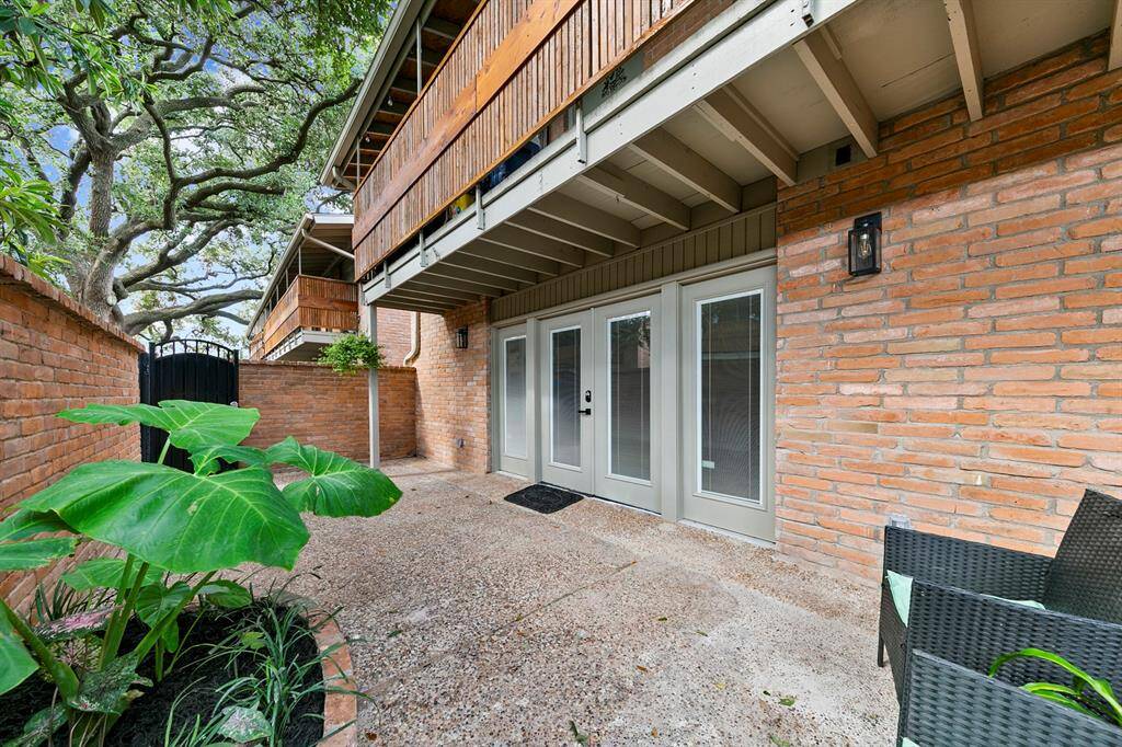 Enjoy outdoor living on the private patio, perfect for relaxing or entertaining in a serene setting.