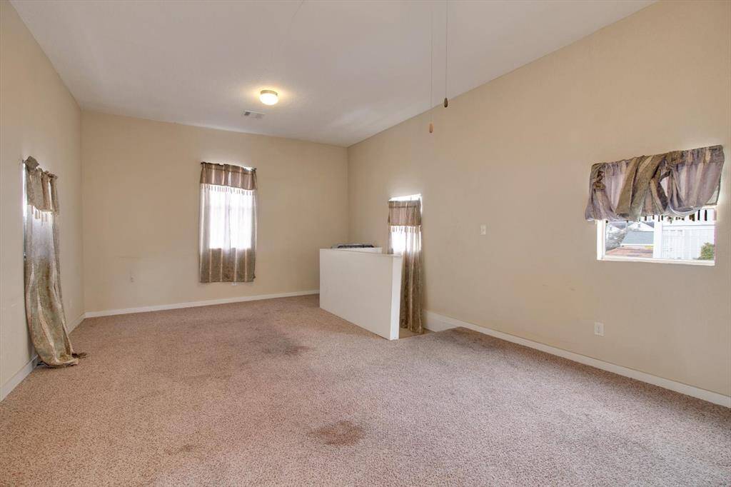 Another view of the second story landing. Family room/den.