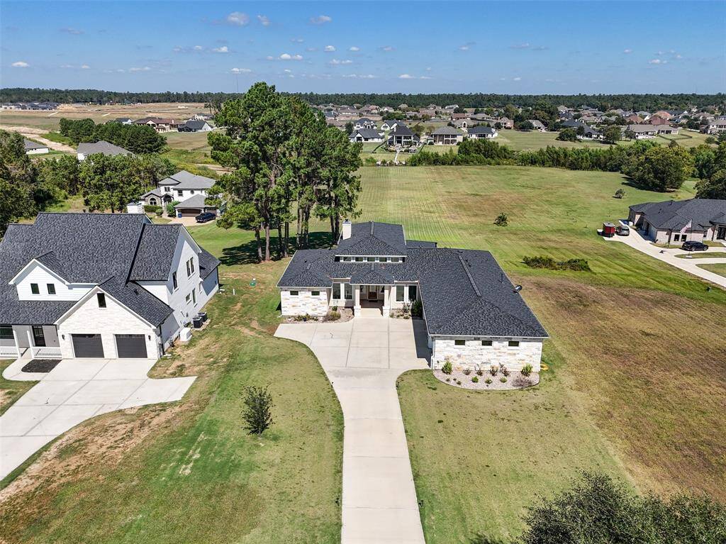 Aerial view of the front of the property looking back towards the lake and Grand Harbor.
