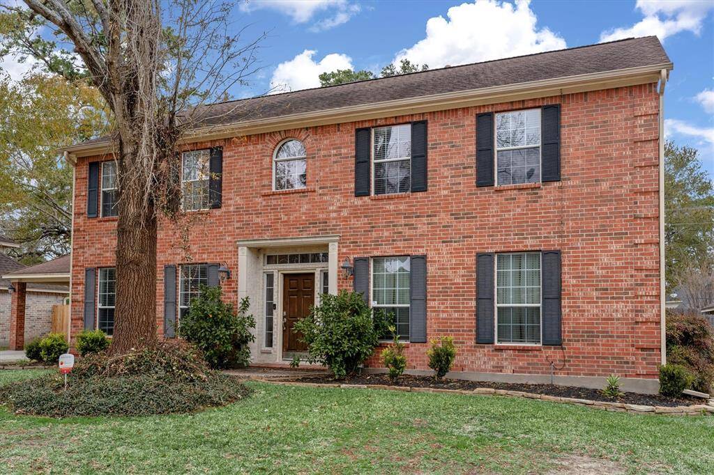 Traditional brick and wood exterior.