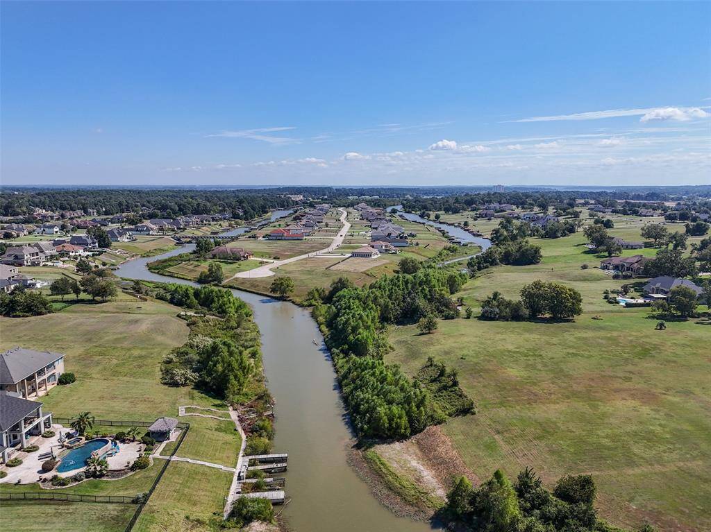Property backs up to Lake Conroe, and this canal leads to the open lake, so if desired you can install a bulkhead and boat slip.