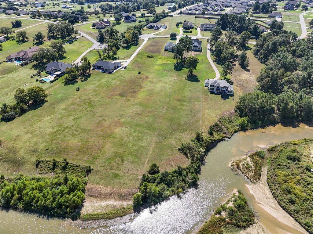View of the property showing all the land going from the house to the lake.