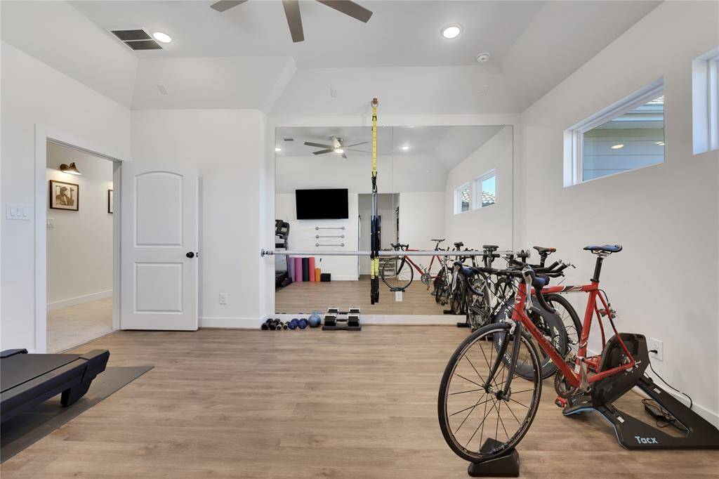 Flex Room 2nd level... Ballet bars, full length mirror, owner used as recreation/workout space