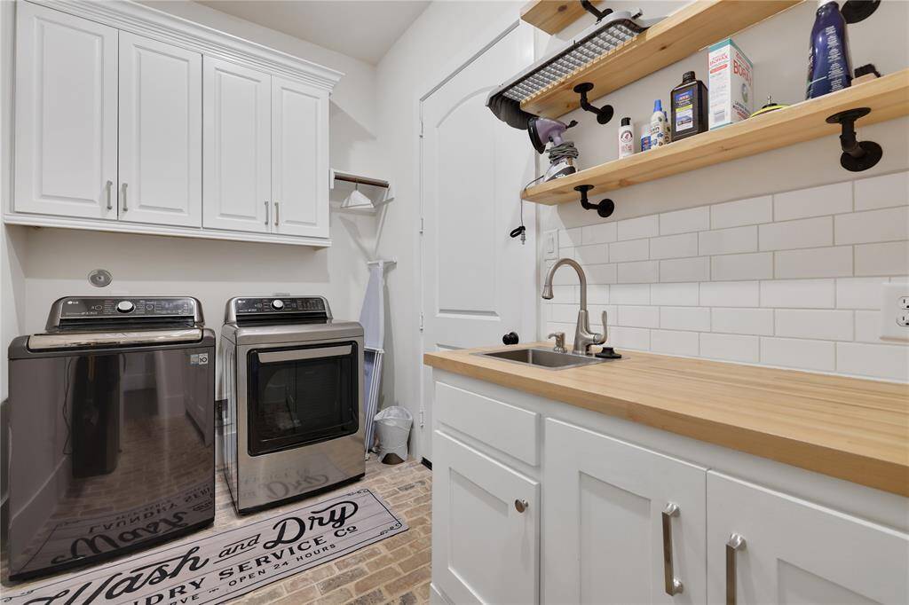 Laundry/utility Room - pretty brick flooring