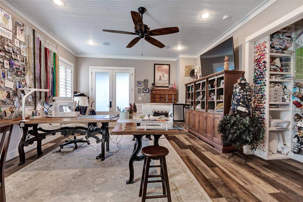 The 3rd bedroom is currently being used as a hobby room and overlooks the front yard