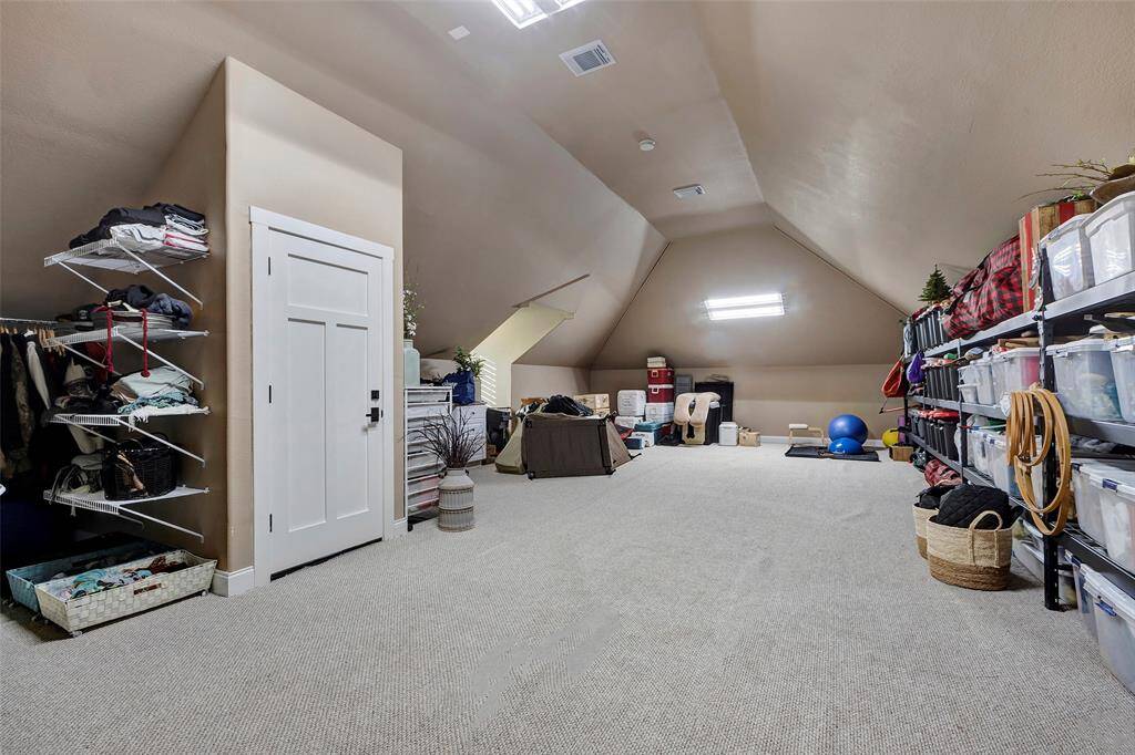 Just above the garage is a large flex room currently being used for storage. It can also be used as a hobby room or art studio, be made into a media room, or even an extensive second home offic/study