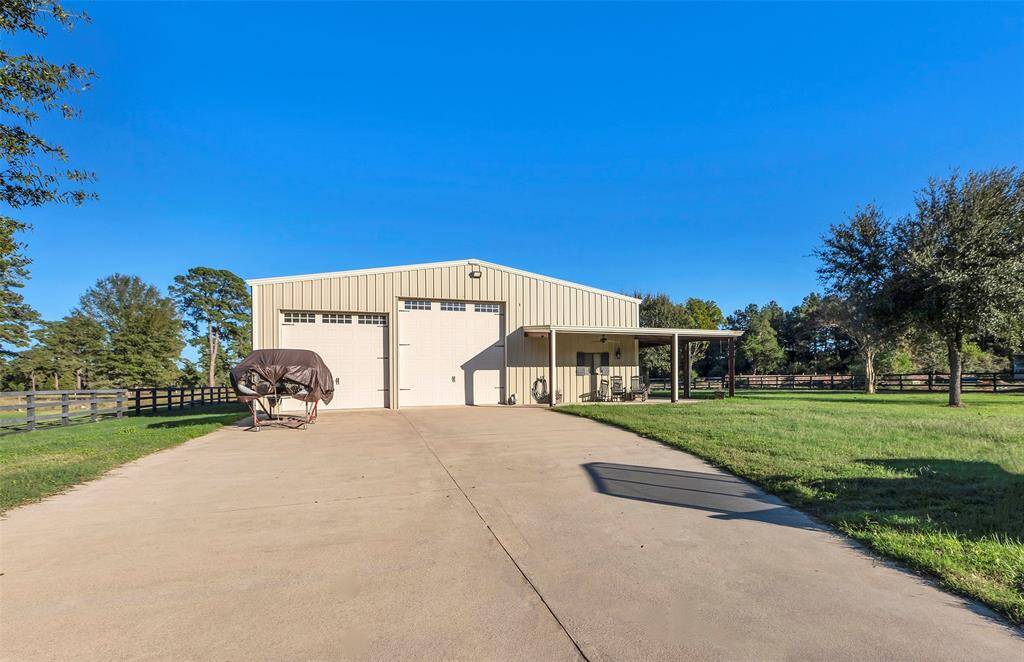 The 3rd building is a barndominium with RV parking, covered porch, loft style storage and a 1250 sq ft 2bedroom/2bath guest house with full kitchen