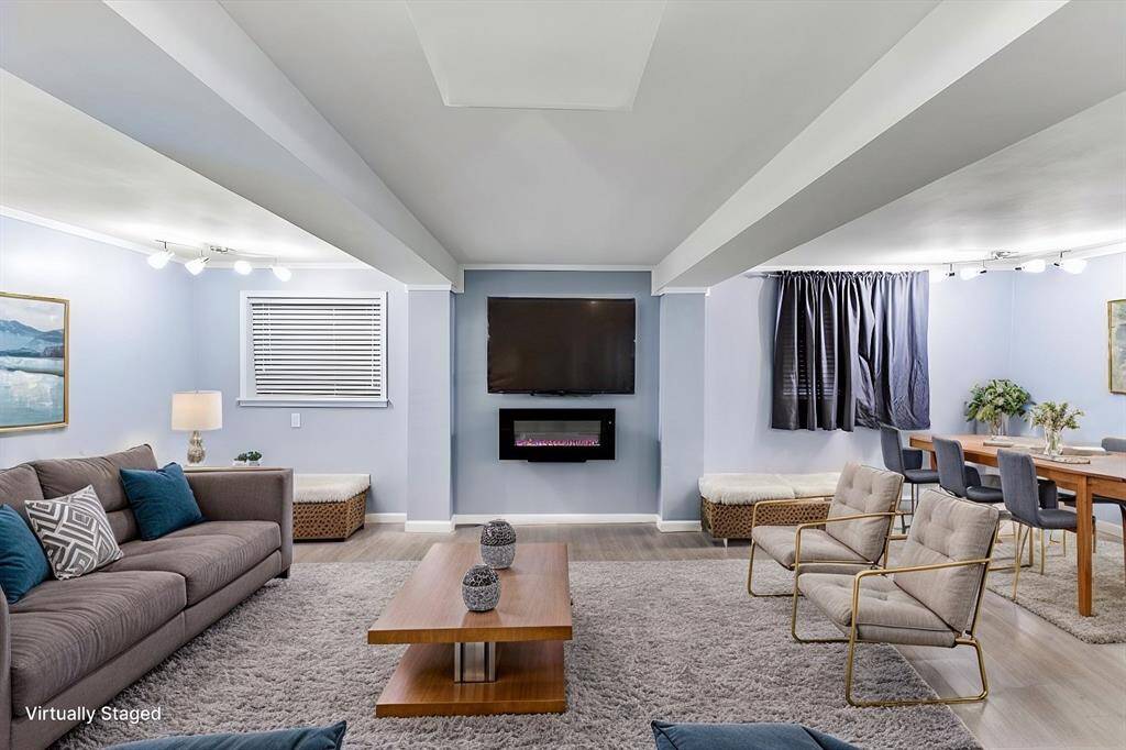 Virtually staged down stairs living room