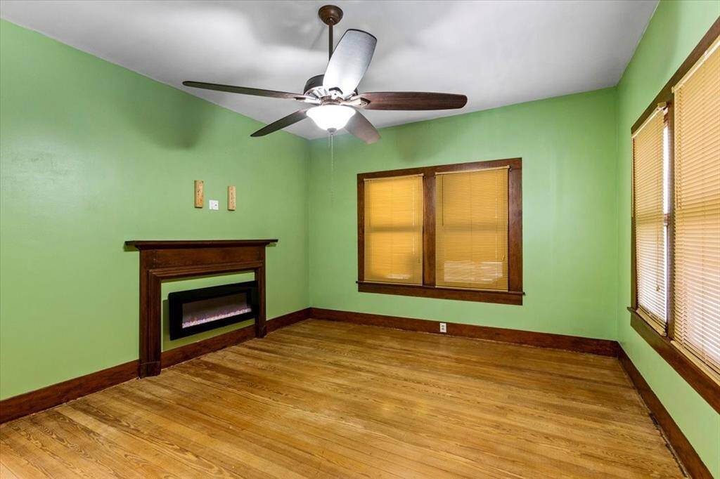 Upstairs Grand living room! 60" Ceiling fans, electric fireplace, beautiful wood floors and trim!