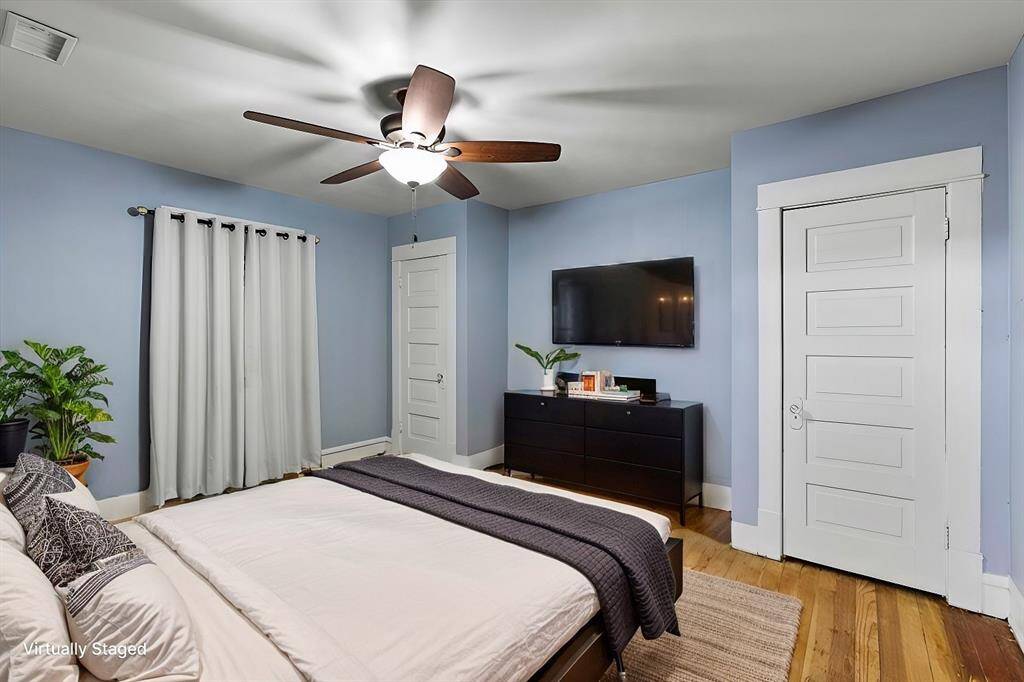 Virtually staged primary bedroom
