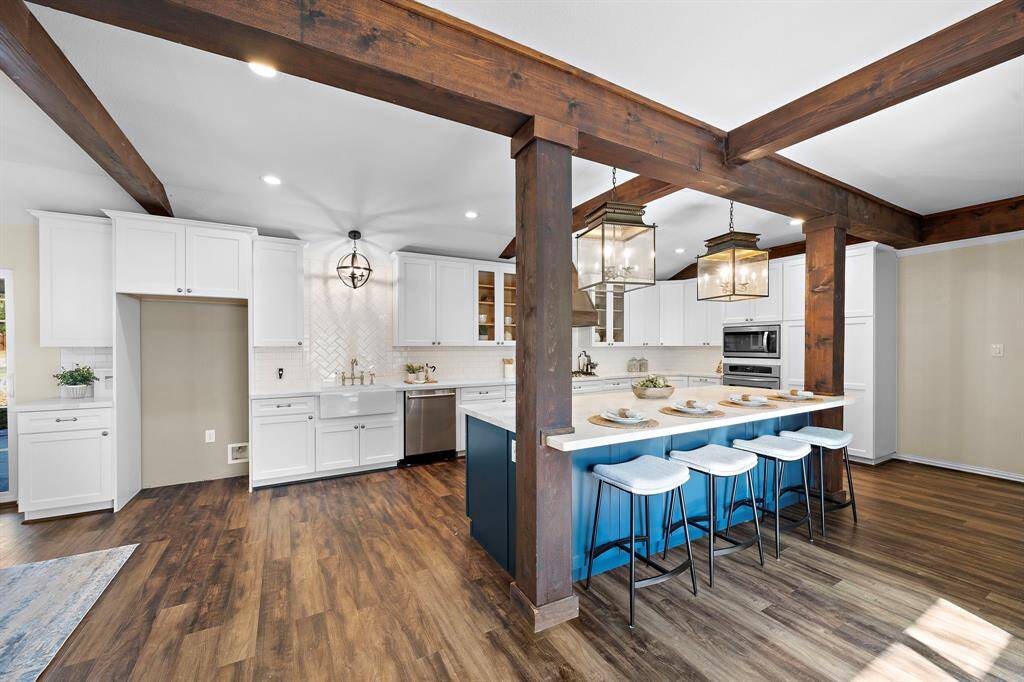 You are greeted with this stunning kitchen as you enter the home.