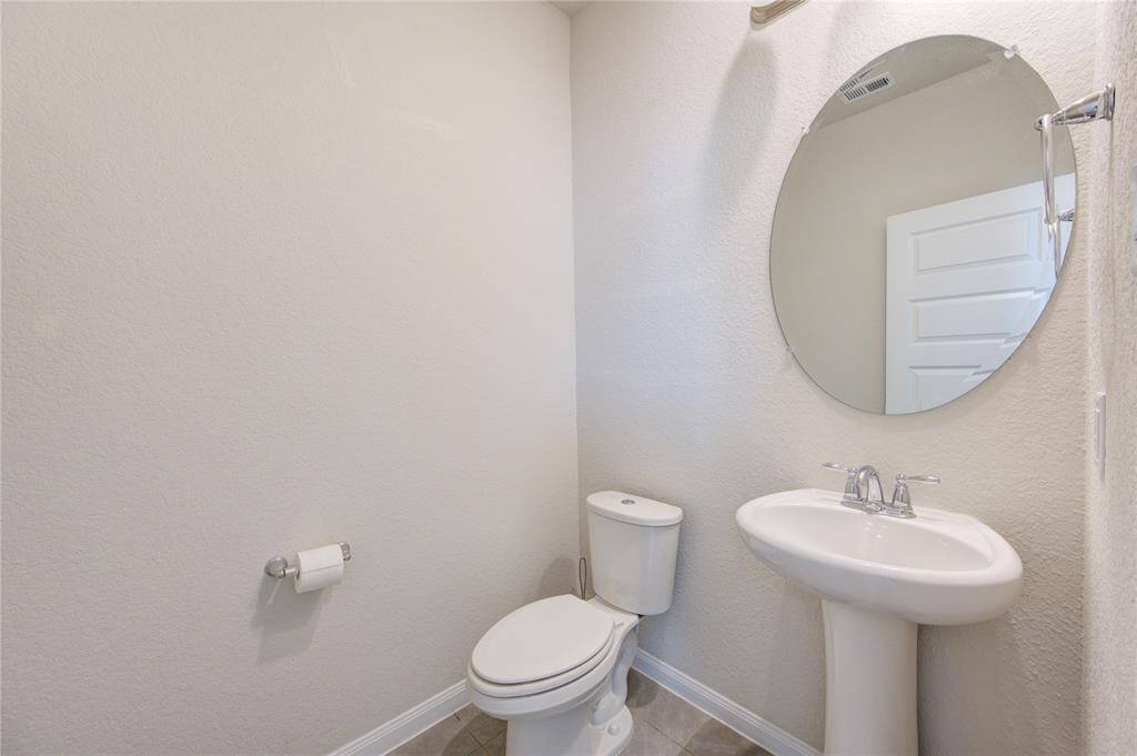 Half bath off entry hallway