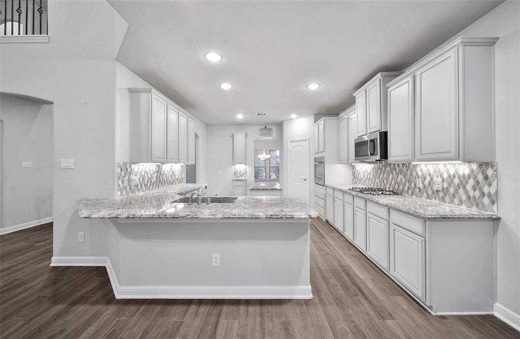 one level breakfast bar perfect for gathering around the kitchen to entertain.