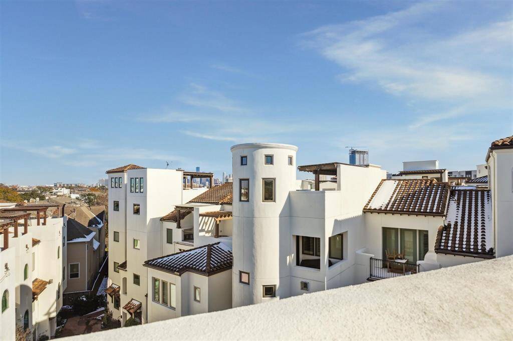 Get a glimpse of downtown from your roof deck!