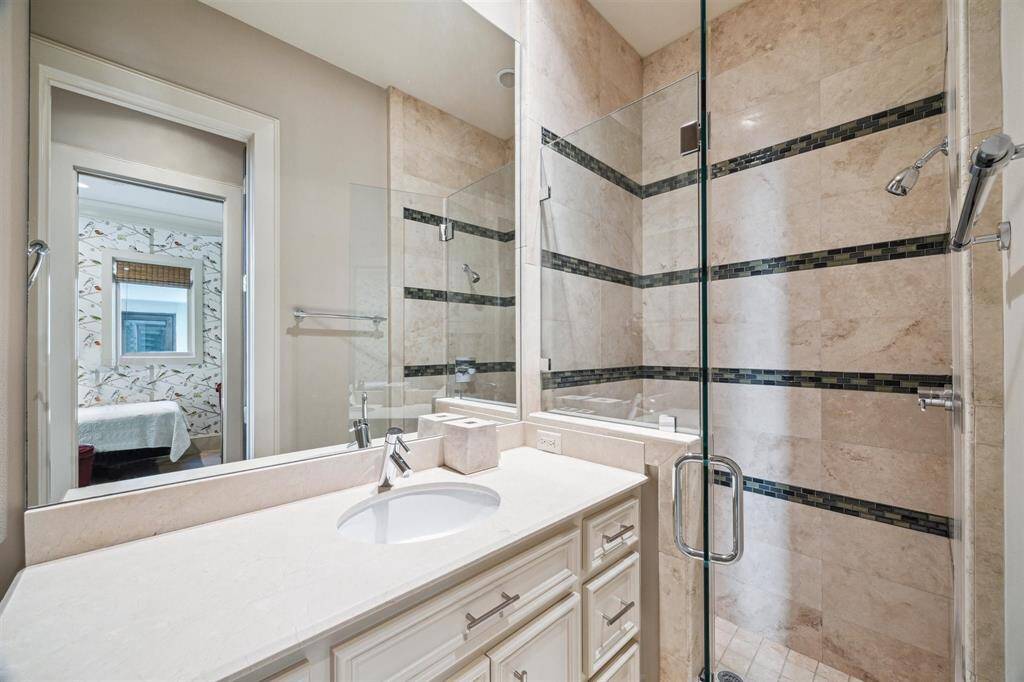 First floor en-suite bath with oversized shower and extended vanity