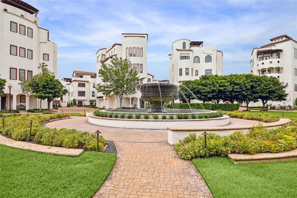 The central plaza’s fountain is the perfect spot to meet neighbors in this dynamic and welcoming community.