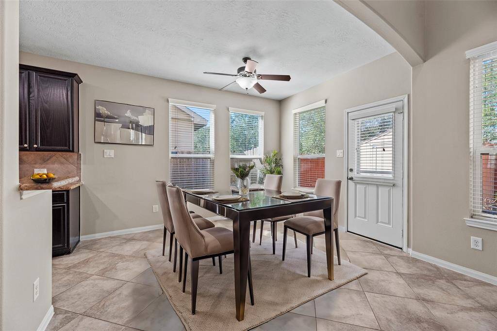 The breakfast area is spacious with views of the beautiful outdoors. Enjoy a hot cup of coffee or a quick snack here. A gorgeous space to enjoy the most important meal of the day.