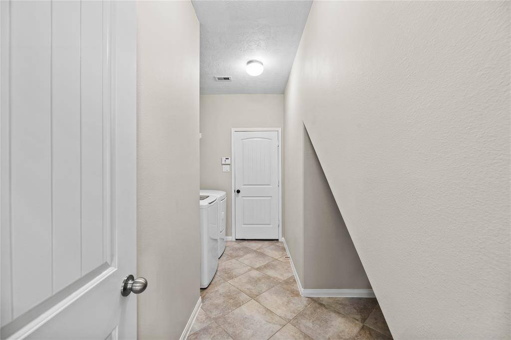 Experience convenience with the in-house utility room, thoughtfully designed with a dedicated laundry area.