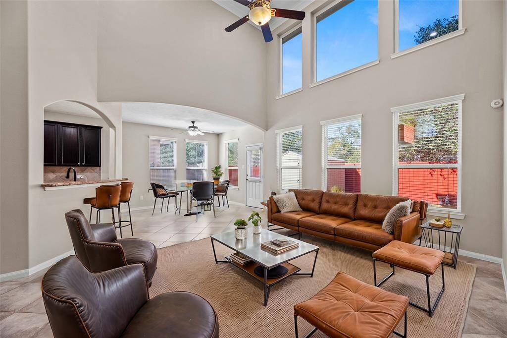 Step into the heart of your home, the Living Space, where dramatic two story ceilings, and wall of windows frames your own personal sunsets every night.