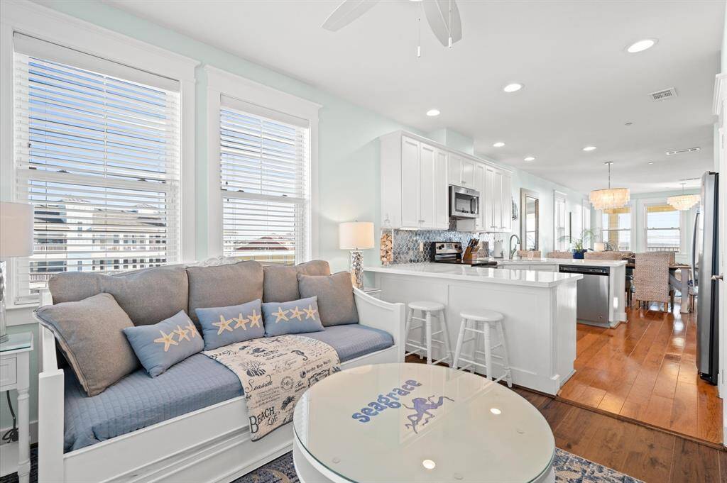 This 1,717 square foot floorplan has a BONUS room off the kitchen for family movie or game nights! Has second balcony with SUNSET bay views!
