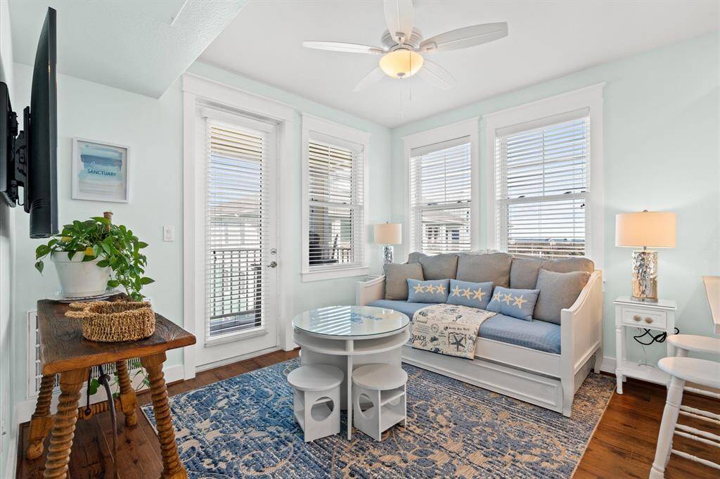 Bonus room with BAY VIEWS! This room has a tv and game table for family fun at the beach! Notice the door to the balcony with views of the BAY!