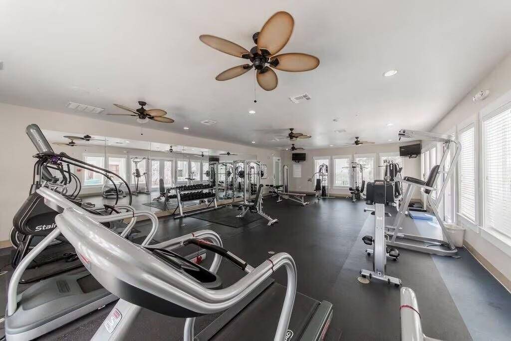 Gym at the Beach Club has weights and machines for owner and guest use.