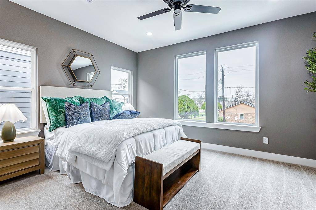 The master bedroom is bright, airy, and spacious.