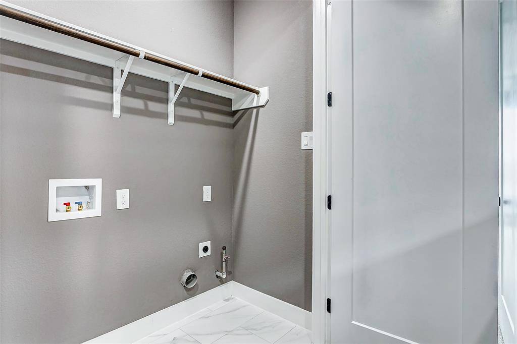 Convenient laundry room for effortless chores.