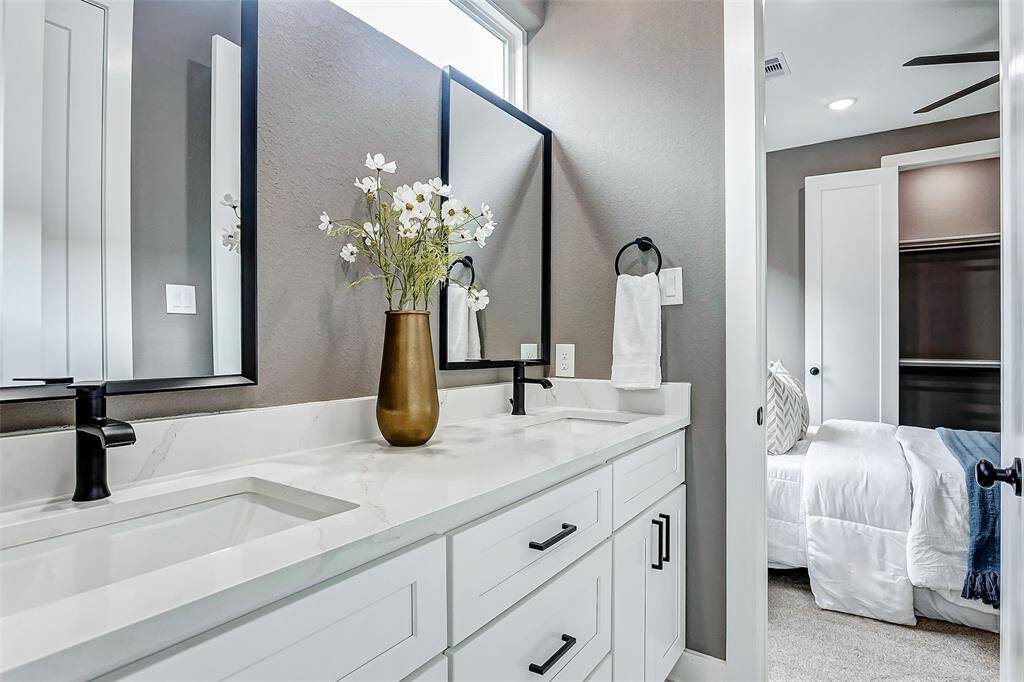 Enjoy the sophisticated convenience of a Jack and Jill bathroom.