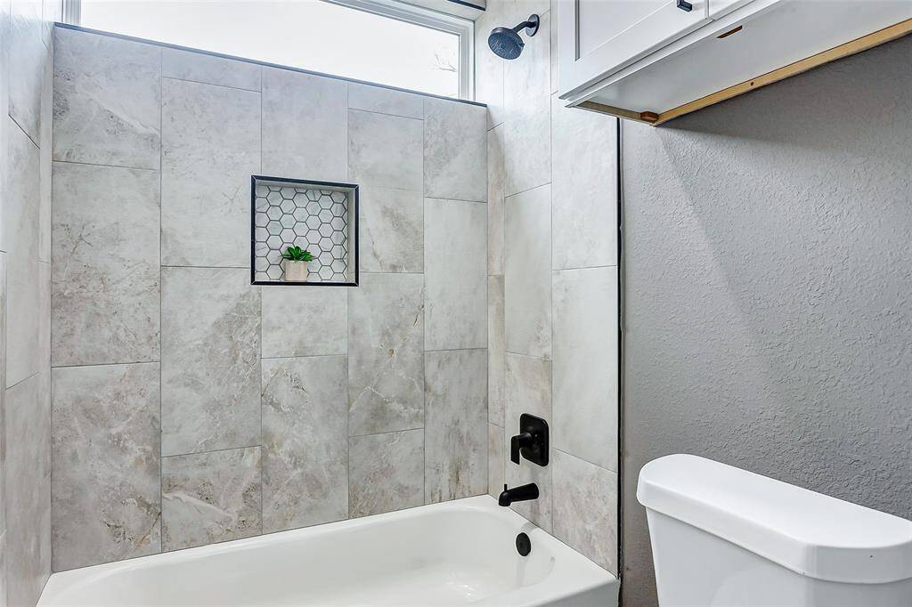 Indulge in ultimate relaxation with this elegant bathtub oasis at home.